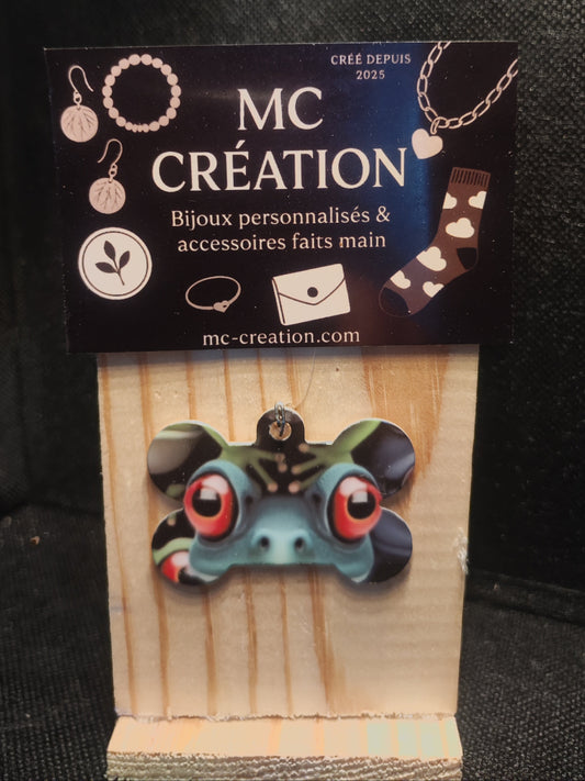 médaille métal chien grenouille