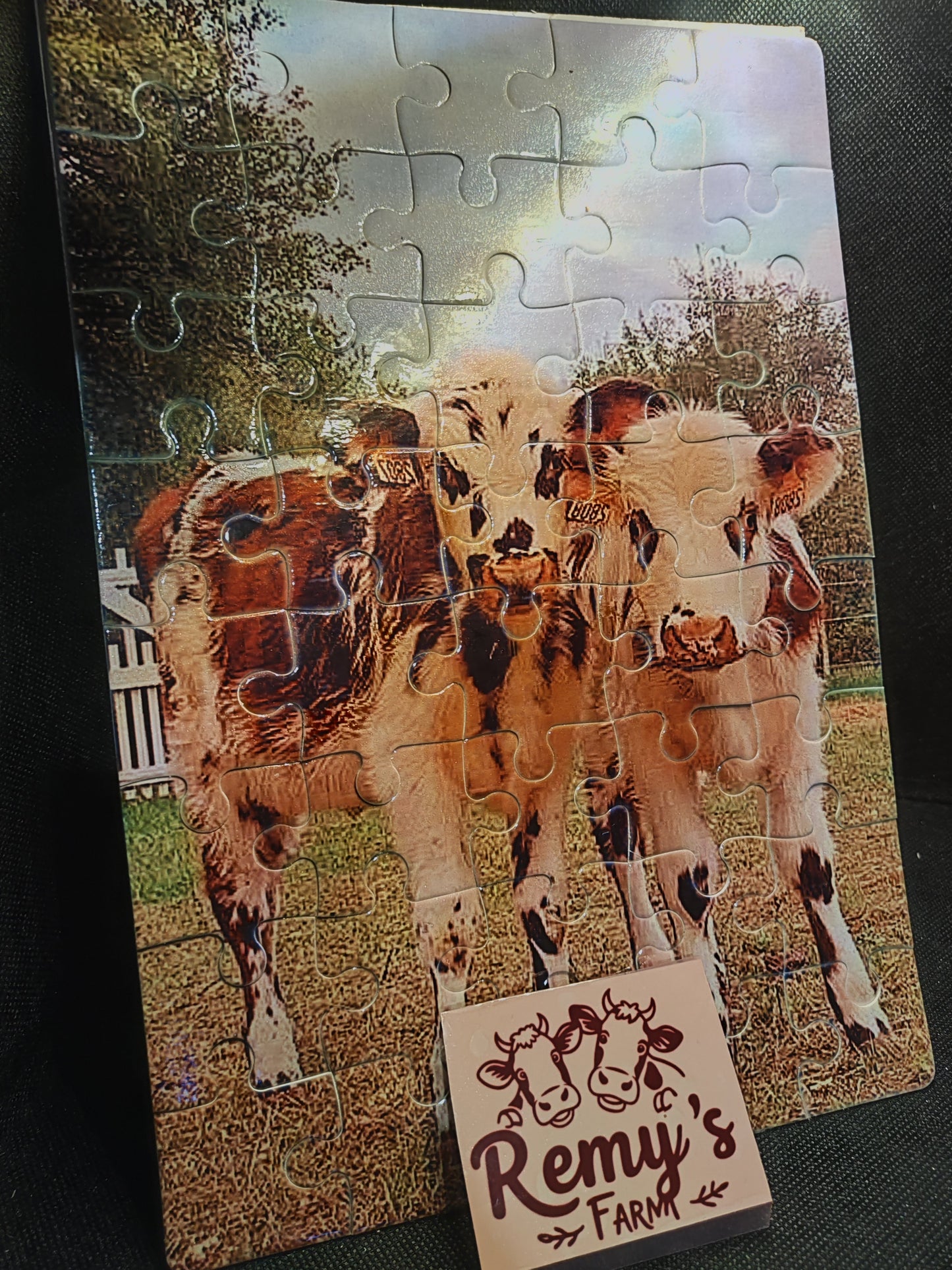 Puzzle sur le thème des vaches de la ferme.